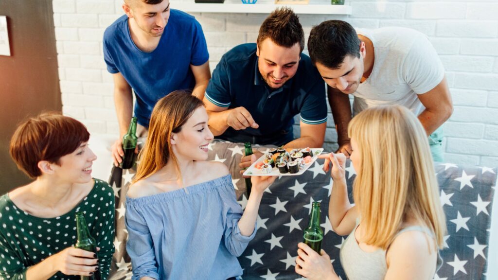 Foreigners enjoying sushi