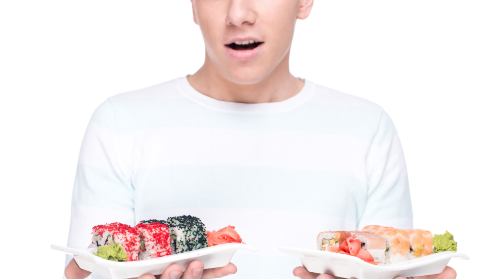 a man holding a pair of packs of sushi rolls